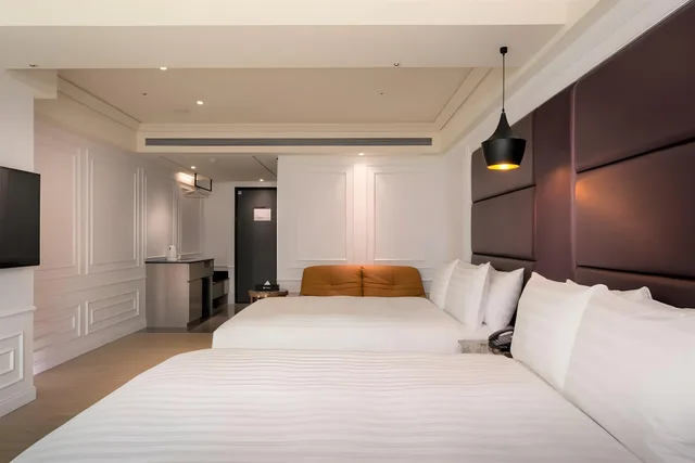 غرفة ديلوكس رباعية بسريرين مزدوجين بحوض استحمام، Sun Hao Hotel.Taichung 1/1