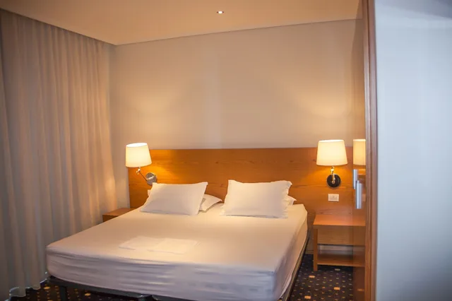 غرفة عائلية بسرير كوين وسريرين منفصلين بشرفة، Agimi And S Hotel 3/10