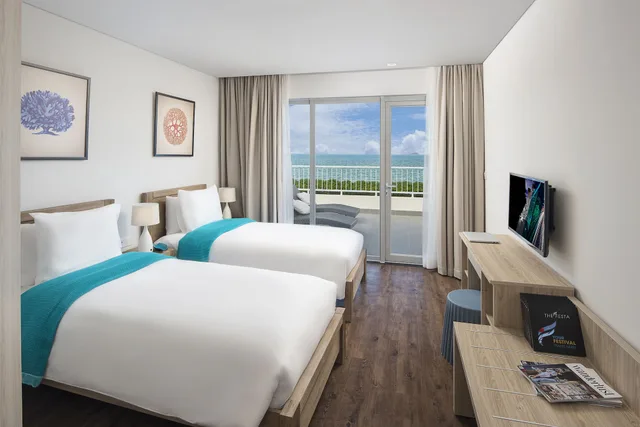 جناح بريميير بسرير كينج وسريرين منفصلين بإطلالة على البحر بغرفتي نوم، The Pearl Hoi An 4/10