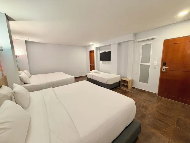غرفة عائلية بسرير كينج وسريرين مزدوجين، Hotel Caribbean Cartagena 1/10