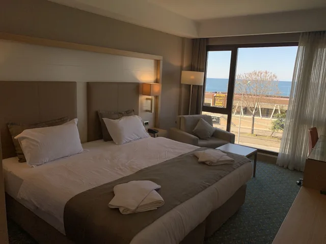غرفة ديلوكس بسرير كوين بإطلالة على البحر مع أريكة، Blue Sea Hotel 3/8