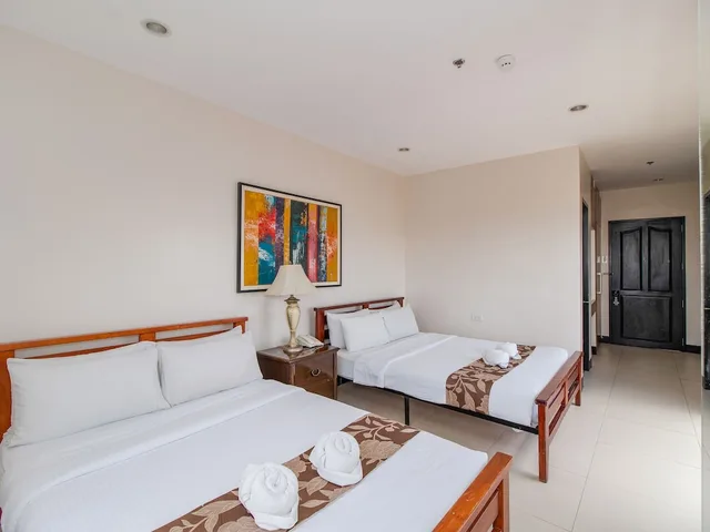 غرفة رباعية بسريرين مزدوجين، Main Hotel And Suites 2/2