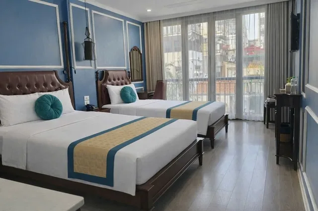 غرفة عائلية ثلاثية بسرير كوين وسرير فردي بإطلالة على المدينة بشرفة، Suddha Boutique Hotel 8/10
