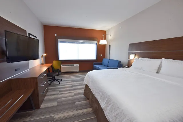 Suite, King Bed, Sofa, Living Area, Holiday Inn Express & Suites Orlando - Lake Nona Area 2/5