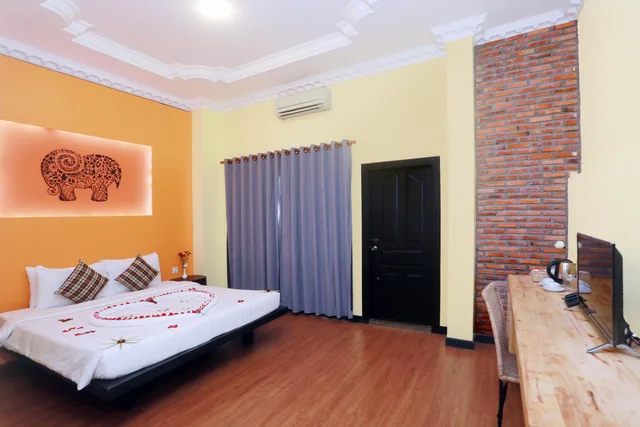 غرفة ديلوكس بسرير مزدوج بشرفة، Central Indochine D Angkor Hotel 2/10