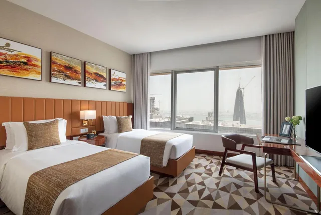 One Bedroom Suite Twin Deluxe with Westbay Beach Access، The Bentley Luxury Hotel and Suites Doha 1/2