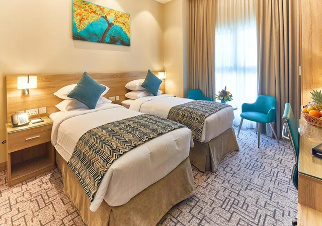 غرفة متصلة كلاسيكية بسرير فردي، Rose Plaza Hotel Al Barsha 1/7