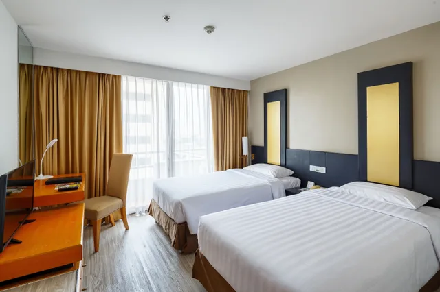 غرفة بريميوم ديلوكس بسرير فردي وسرير كوين، Gold Orchid Bangkok 1/2