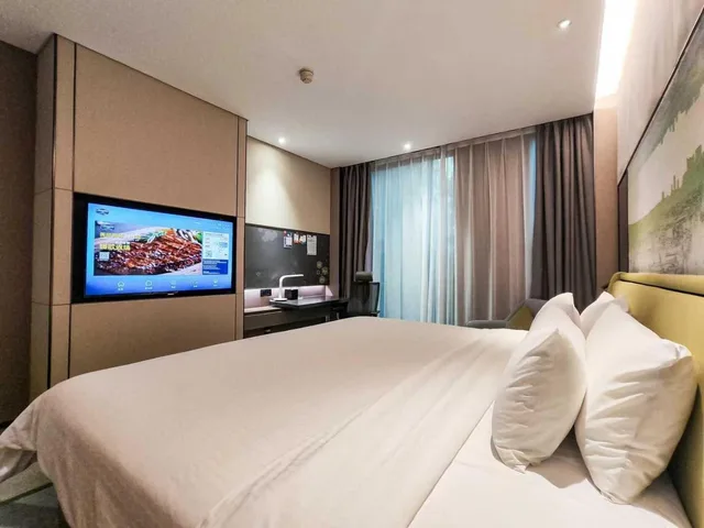 غرفة ديلوكس بسرير كينج وسرير كوين، Hampton by Hilton Guangzhou Tianhe Sports Center 1/10