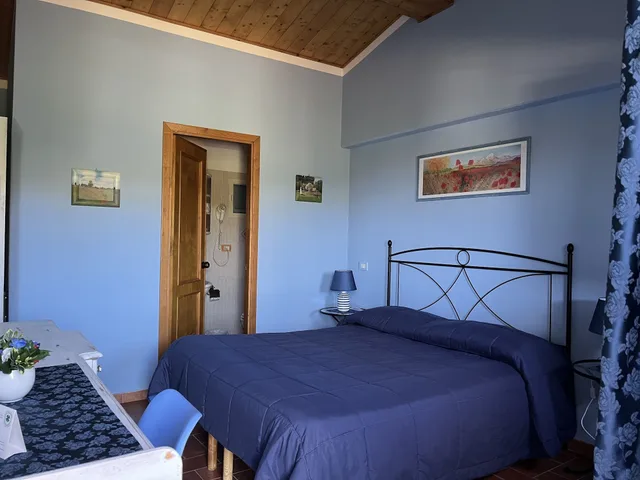 غرفة بسرير كوين، Agriturismo Poggio Del Drago 4/10