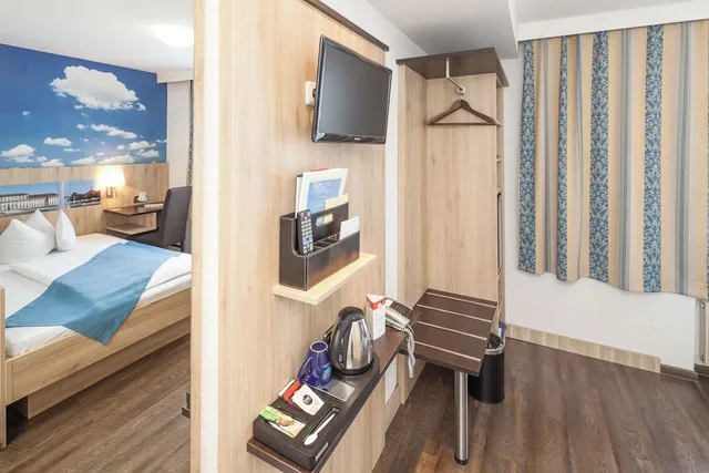 غرفة كومفورت مفردة بسرير مزدوج، Hotel Blauer Karpfen 4/5