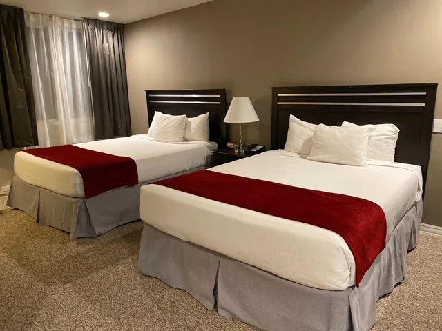 غرفة ديلوكس بسرير كوين، Redac Gateway Hotel 1/4