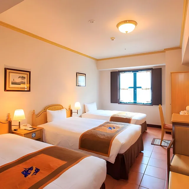 غرفة بثلاثة أسرّة مع سرير إضافي، Hotel Monterey Nagasaki 1/2