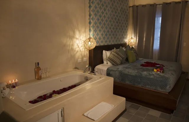 غرفة فاخرة بسرير كينج بجاكوزي، Quinta Margarita Suites 1/7