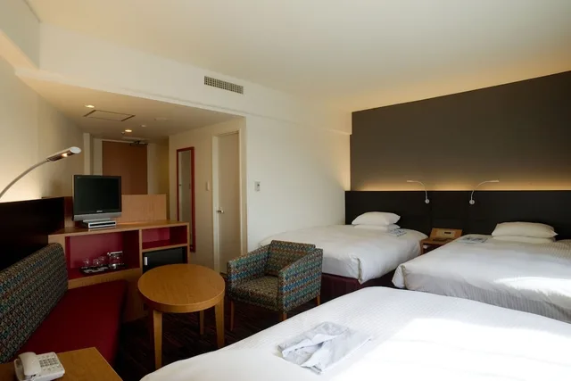 غرفة كومفورت ثلاثية بسريرين مزدوجين في المبنى الرئيسي، Hotel Nikko Narita 1/4