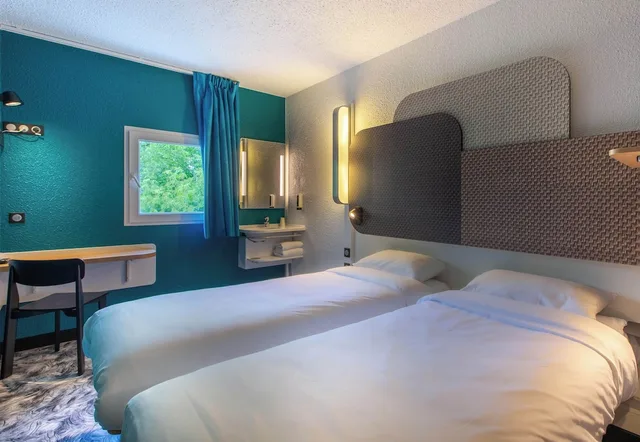 غرفة بسريرين منفصلين، B&B Hotel Chateauroux A20 L Occitane 1/3