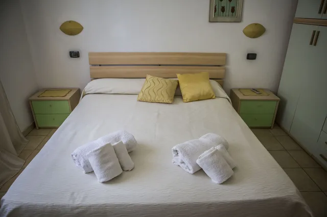 شقة سوبيريور بسرير كوين وسريرين منفصلين بغرفتي نوم، Il Calabriano Villaggio Residence 3/6
