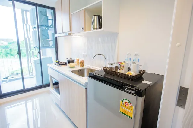 جناح عائلي بسرير كينج وسرير كوين بغرفتي نوم، Connext Residence 7/10