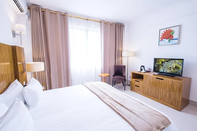 غرفة ديلوكس بسرير كينج، Palms Hotel 1/2