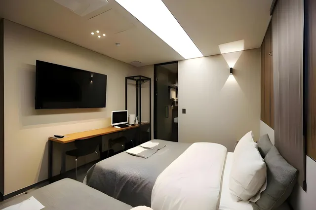 غرفة قياسية بسريرين منفصلين وسرير كوين، Boutique Hotel K Dongdaemun 2/3