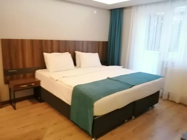 جناح بسرير كينج بإطلالة على البحر، Ferah Suites Hotel 1/10