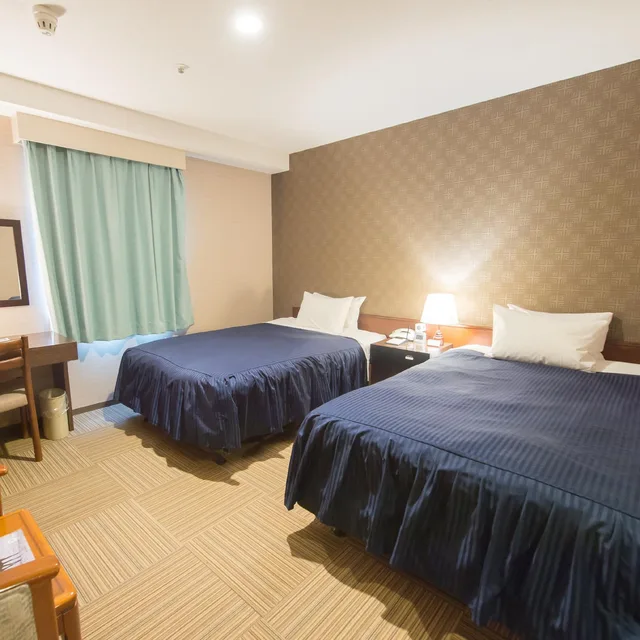 غرفة قياسية بسريرين منفصلين بإطلالة على البحر، Shizunai Eclipse Hotel 1/1