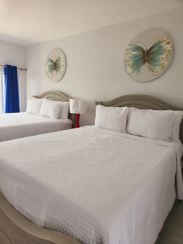 غرفة ديلوكس بسريرين كوين بإطلالة على الحديقة، Harbor Breeze Villas 4/5