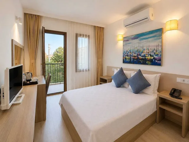 غرفة بسريرين منفصلين بإطلالة على البحر، Aria Doria Otel 3/10
