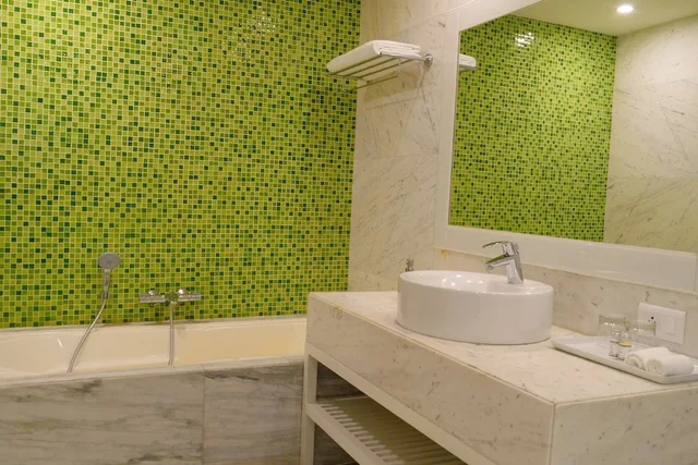 Deluxe, 1 Double and 1 Single Bed, Balcony, Sarovar Portico Outer Ring Road Bengaluru 4/6