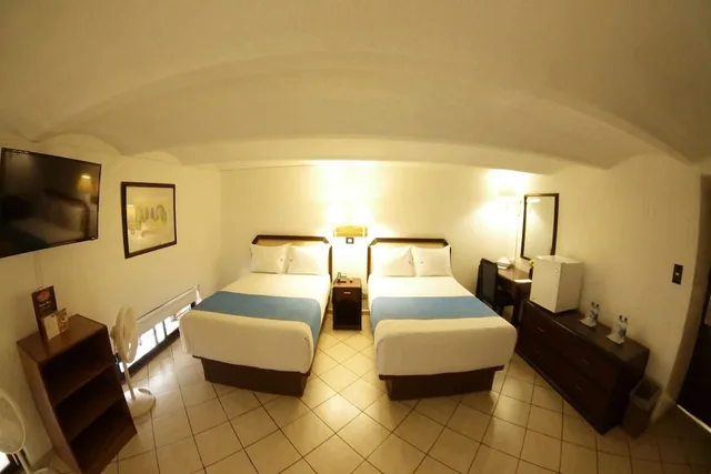 Family, 1 Single and 2 Double Beds، Collection O Hotel Del Portal, Puebla 2/9