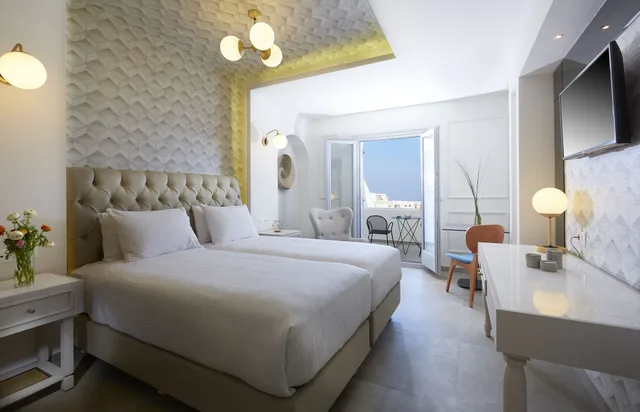 غرفة عائلية بسرير كينج وسريرين منفصلين بإطلالة على المسبح بغرفتي نوم بحوض استحمام، De Sol Hotel and Spa 3/9