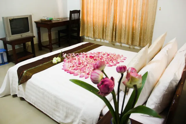 غرفة بسرير كوين، Tropical Breeze Guesthouse 2/4