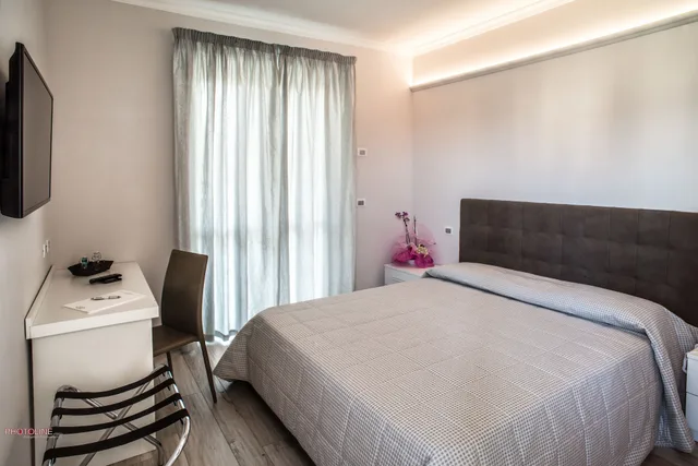 غرفة كلاسيكية عائلية بأربعة أسرّة، Villa Giulia Ciampino 1/2