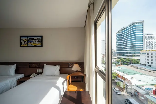 غرفة سوبيريور بسريرين منفصلين بإطلالة جزئية على البحر، Tamarind Hotel Da Nang 2/10