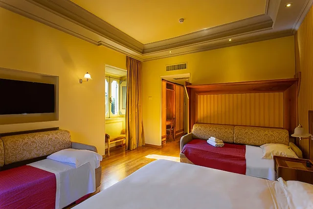 غرفة ديلوكس رباعية، Villa Tuscolana Park Hotel 2/4