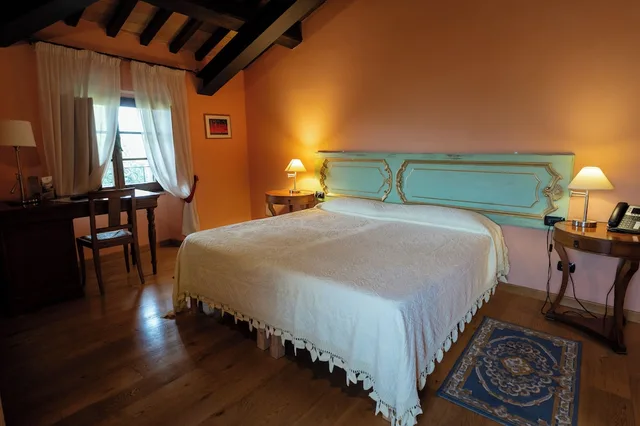 جناح بانورامي بسرير كوين، Castello di Baccaresca 1/10