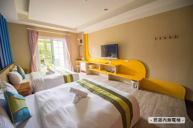 غرفة رباعية بسريرين مزدوجين بشرفة، Kenting Ding Jia Hotel 2/2