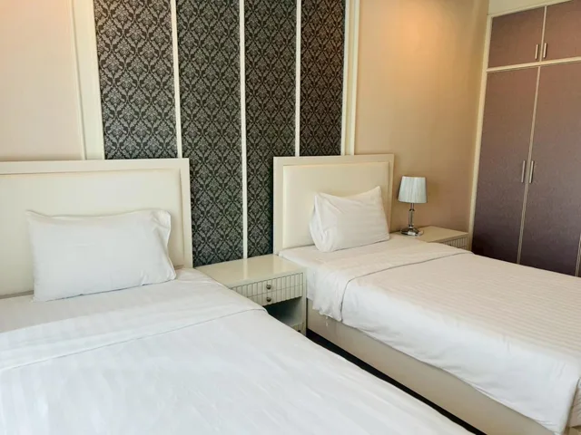 غرفة بسريرين منفصلين بحوض استحمام، Harmony Resort Hotel 3/10