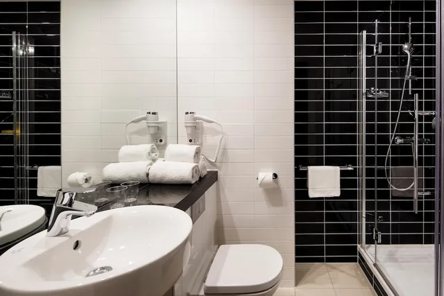 جناح بسرير فردي بغرفة نوم واحدة مع أريكة، Holiday Inn Express Amsterdam Arena Towers 3/5