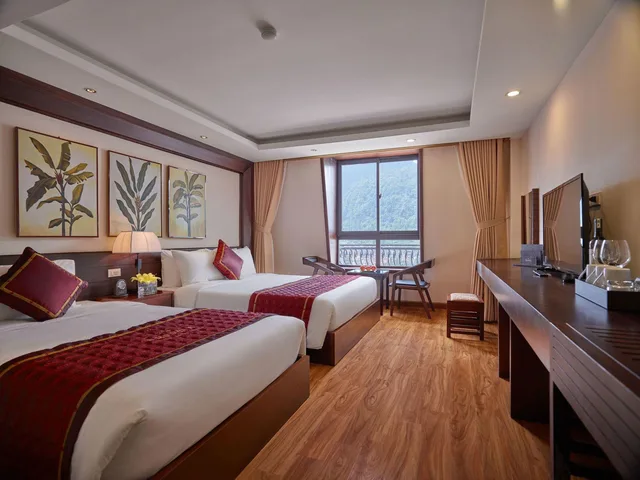 غرفة ديلوكس ثلاثية بسرير كوين وسرير فردي، Freesia Hotel 1/1