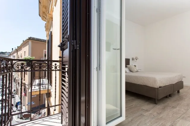 غرفة ديلوكس بسرير كوين وسرير فردي، Residence Le Vie Del Centro 4/7
