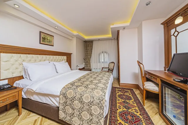 غرفة اقتصادية بسرير كوين، Spectra Hotel 1/4