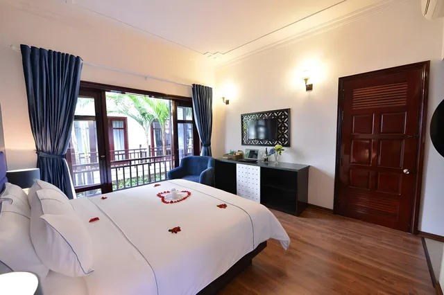 غرفة ديلوكس بسرير مزدوج بإطلالة على الحديقة، TTC Hotel Hoi An 4/4