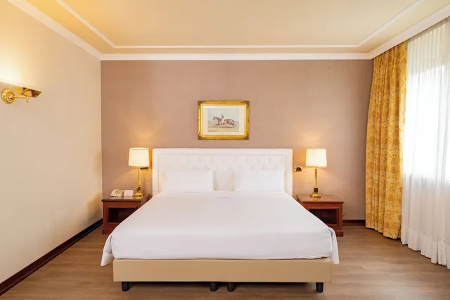 غرفة ديلوكس ثلاثية بسرير كينج، Hotel Internazionale 1/5