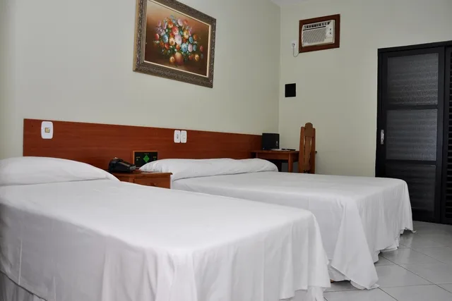 غرفة قياسية رباعية بسرير مزدوج وسريرين منفصلين، Carolina Plaza Hotel 1/7