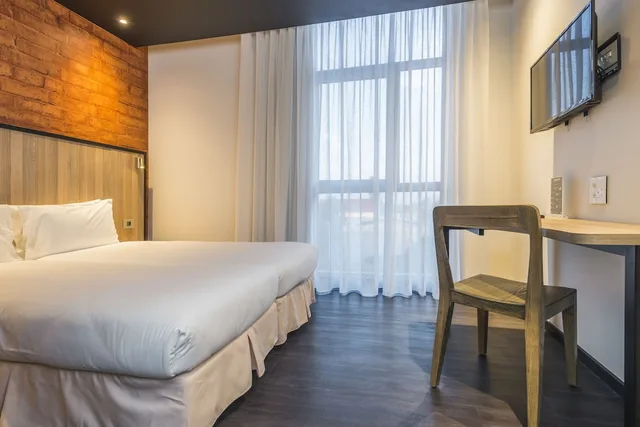 غرفة قياسية بسرير كوين، ONOMO Hotel Maputo 1/4