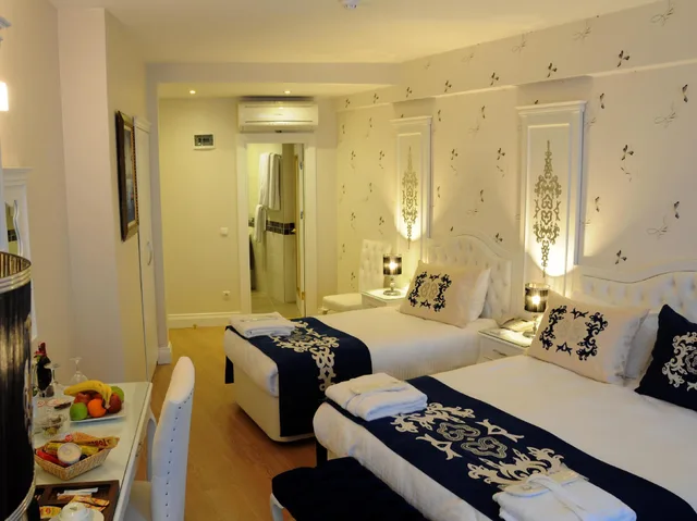 جناح بسرير مزدوج وسرير فردي مع أريكة، Sarnic Premier Hotel 2/2