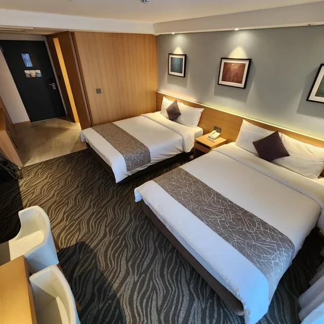 غرفة عائلية بسريرين منفصلين بشرفة، Seogwipo JS Hotel 7/10