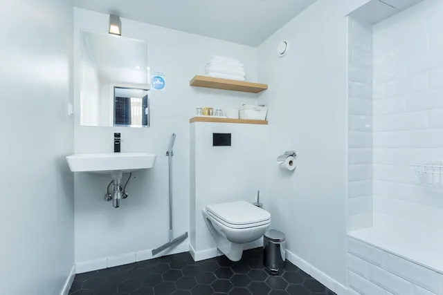 غرفة بسرير فردي مع أريكة، Angleterre Apartments 1/2