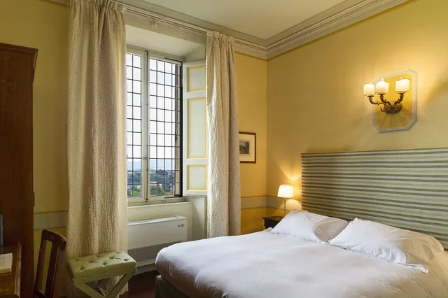غرفة قياسية بسرير كوين بإطلالة على الحديقة، Palazzo Ravizza 2/4